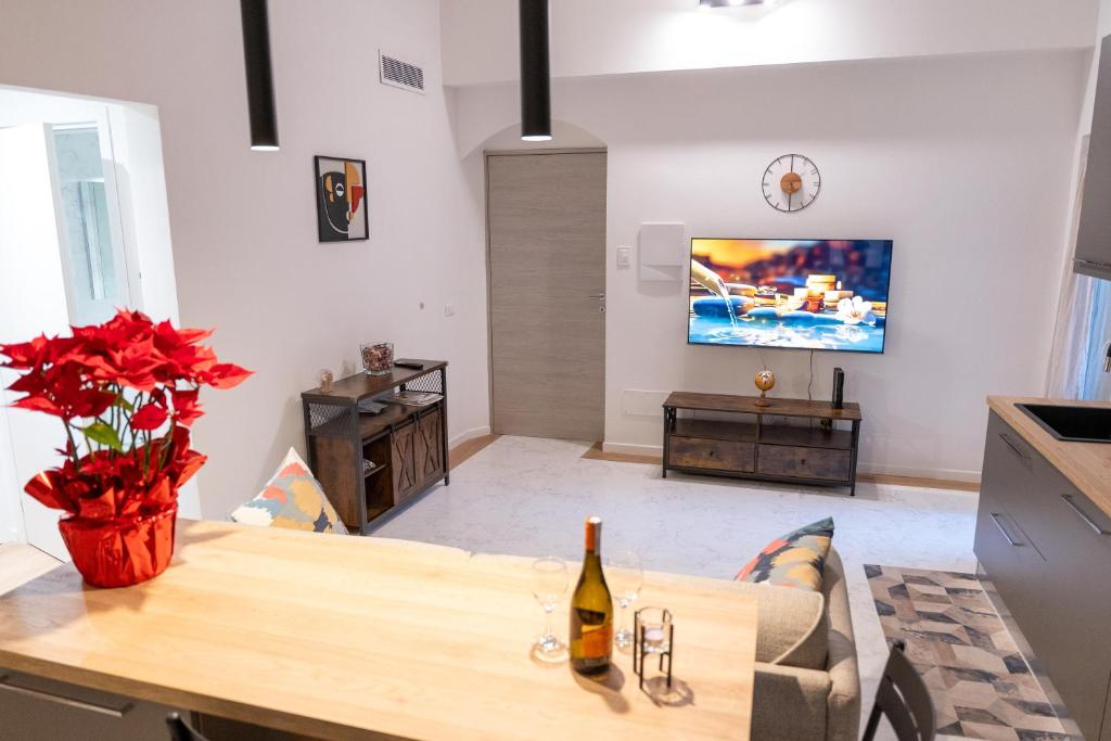 TV a/nebo společenská místnost v ubytování L'ANGOLO di GALILEO