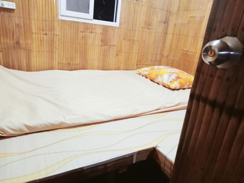 Postel nebo postele na pokoji v ubytování JUNGLE GYM LA UNION Prana fan kubo 2 pax