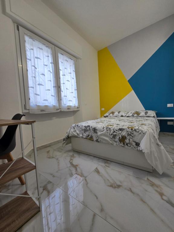 Postel nebo postele na pokoji v ubytování Casa MaDo