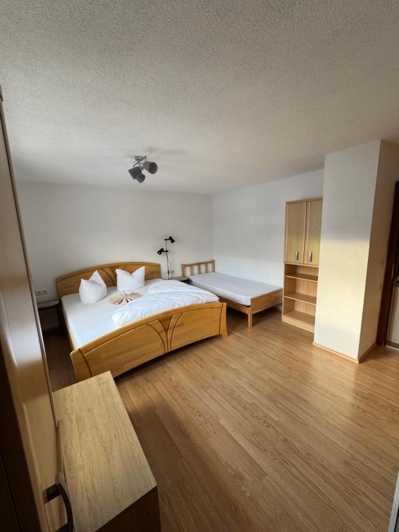 Postel nebo postele na pokoji v ubytování Apart Weitblick Executive Suite