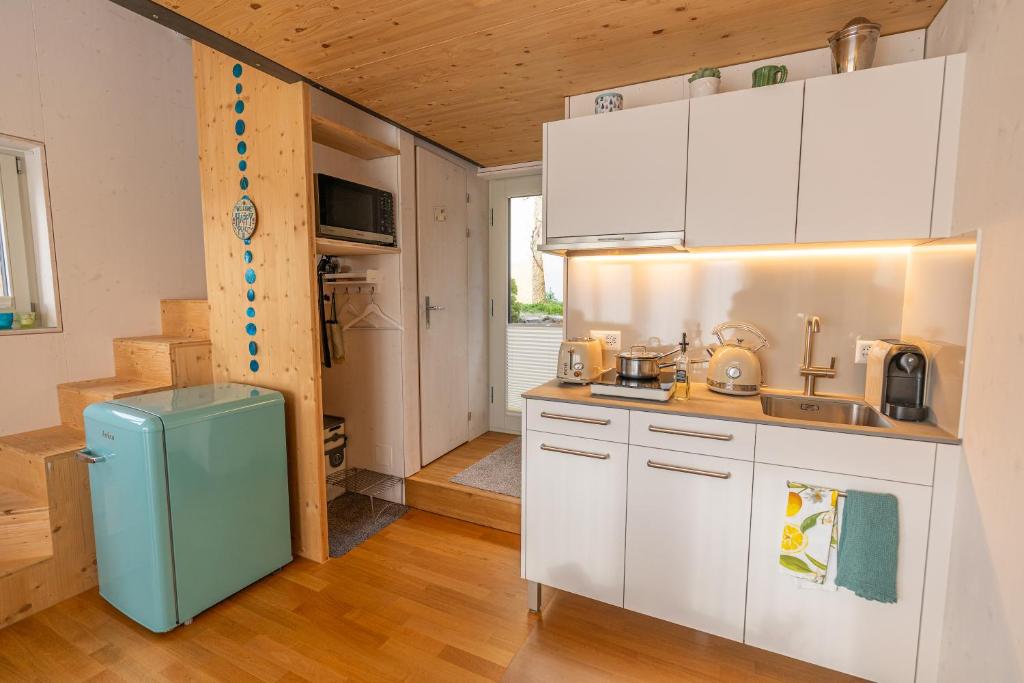Kuchyň nebo kuchyňský kout v ubytování Tiny House Chez Claudine - Relaxen, Workspace, Nähe Thermen, Netflix, free Parking & Wifi