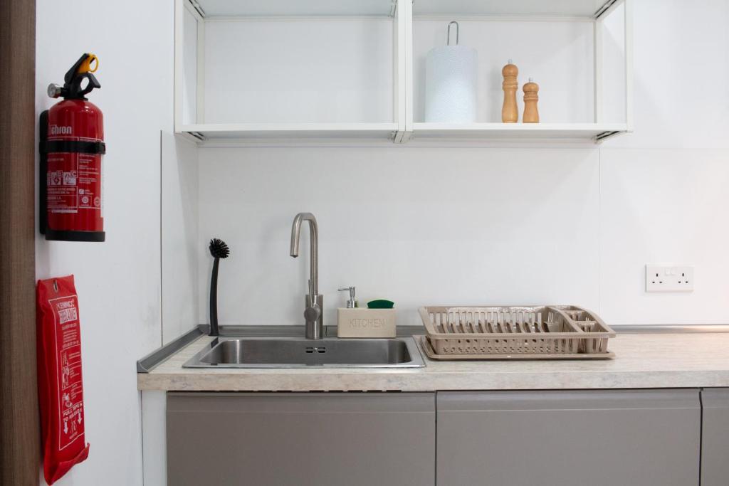 Kuchyň nebo kuchyňský kout v ubytování Sandstone Apartment 17