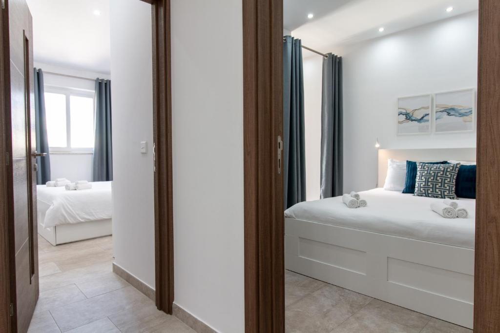 Postel nebo postele na pokoji v ubytování Sandstone Apartment 17