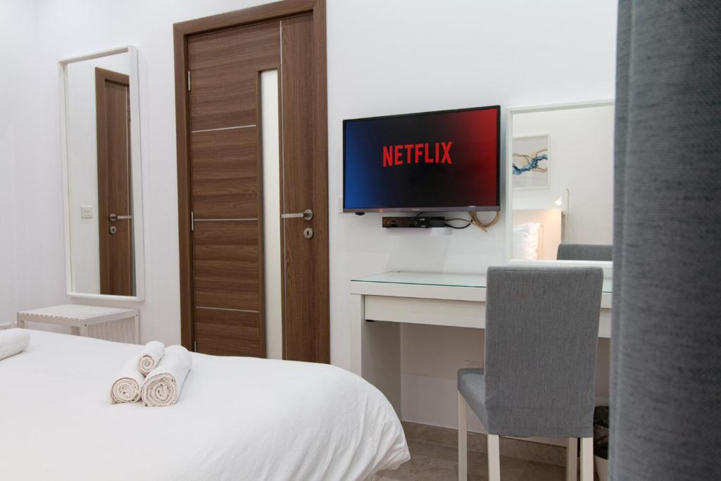 Postel nebo postele na pokoji v ubytování Sandstone Apartment 17