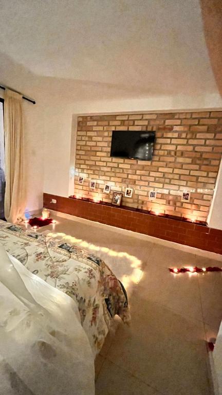 Voodi või voodid majutusasutuse Hostal Amanari toas