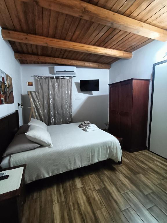 Postel nebo postele na pokoji v ubytování Bed and breakfast Raggio di Sole