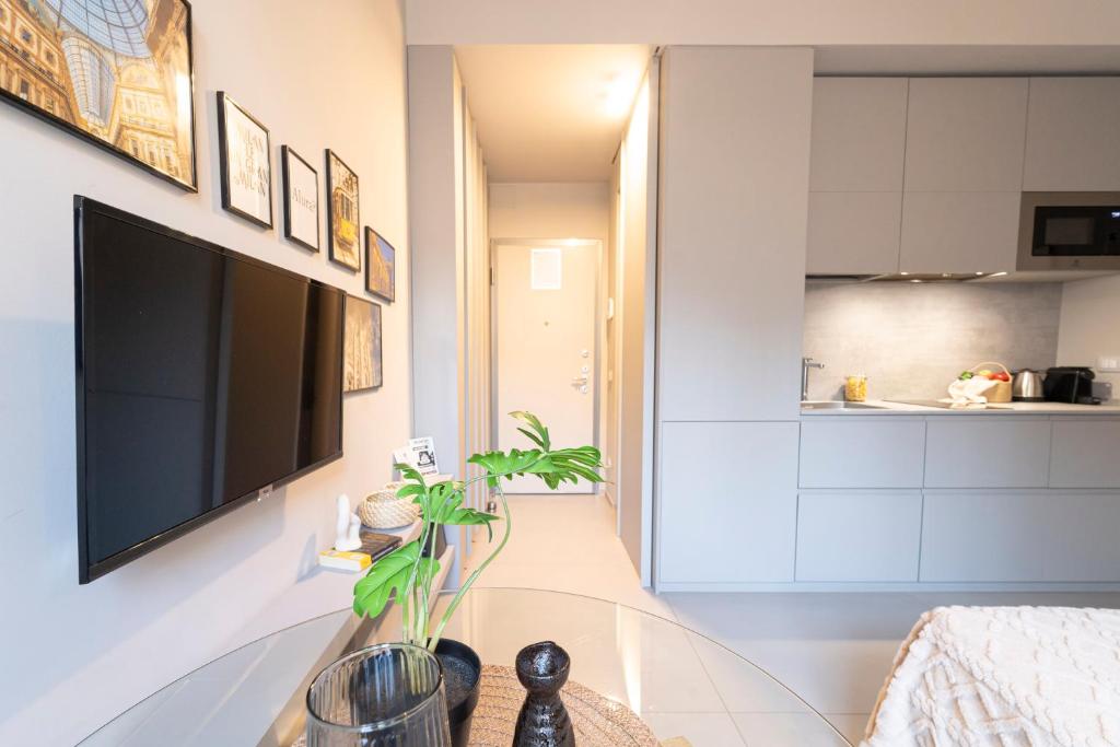 Televízia a/alebo spoločenská miestnosť v ubytovaní Design Studio - Piazzale Lodi - Porta Romana