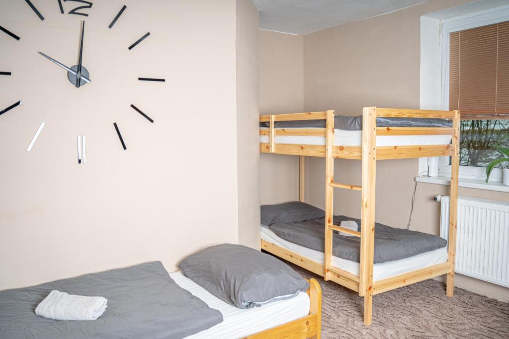 Postel nebo postele na pokoji v ubytování Ubytování Omega Sobotín