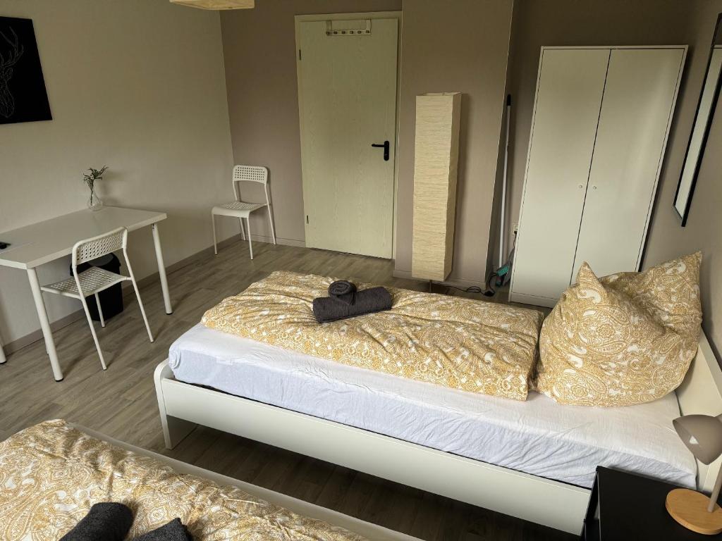 Postel nebo postele na pokoji v ubytování Pension Platzhirsch 2