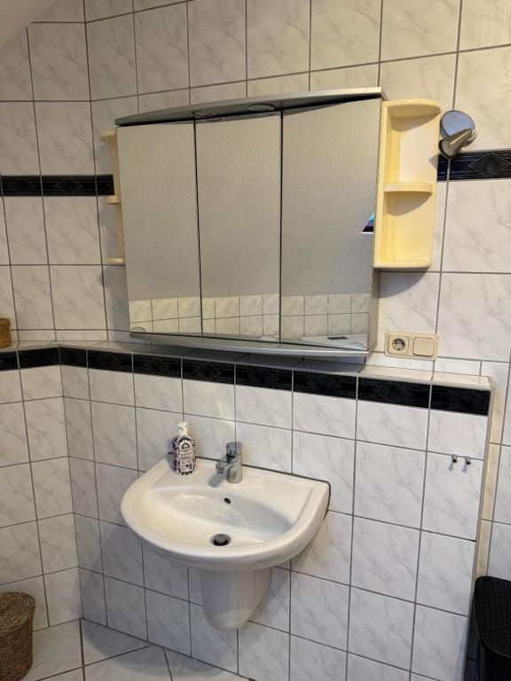 Koupelna v ubytování Pension Platzhirsch 2