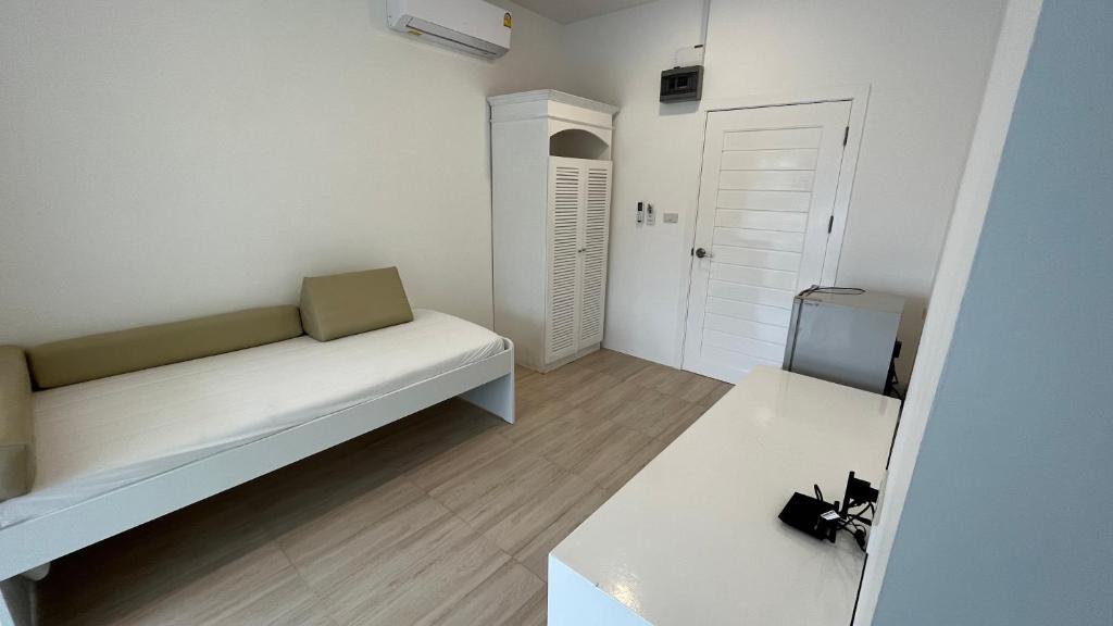 Postel nebo postele na pokoji v ubytování PP Blue Sky Resort-SHA Plus
