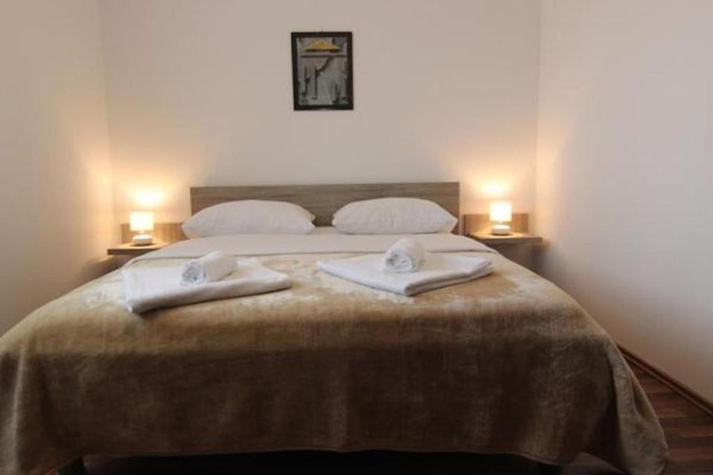 Posteľ alebo postele v izbe v ubytovaní Family friendly apartments Kim - by TA Leut Agency