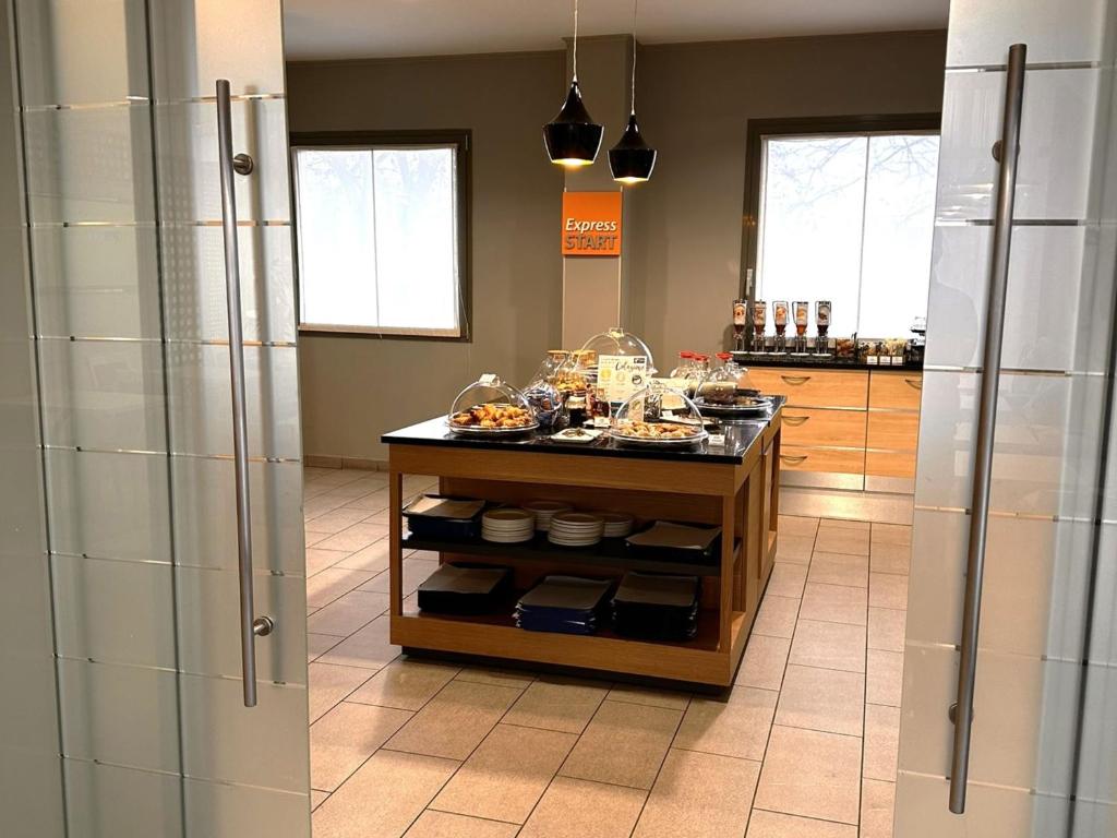 Kuchyň nebo kuchyňský kout v ubytování Holiday Inn Express Parma by IHG
