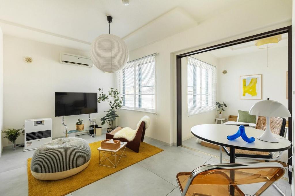 TV a/nebo společenská místnost v ubytování Cozy Stay Sapporo East