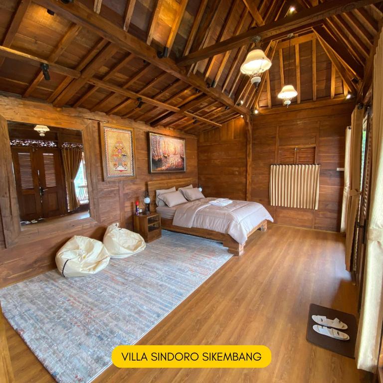 Postel nebo postele na pokoji v ubytování Bagas Luxury Camp Telaga Menjer