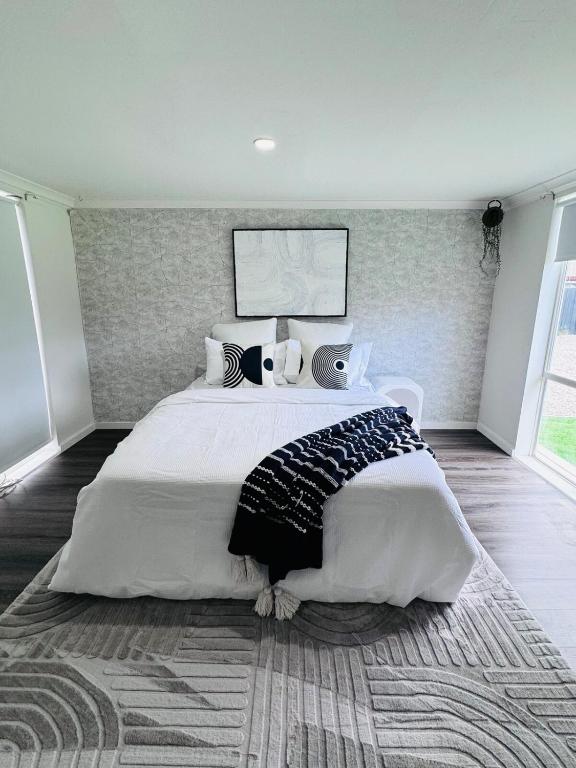 Voodi või voodid majutusasutuse Modern Escape with Open Yard toas
