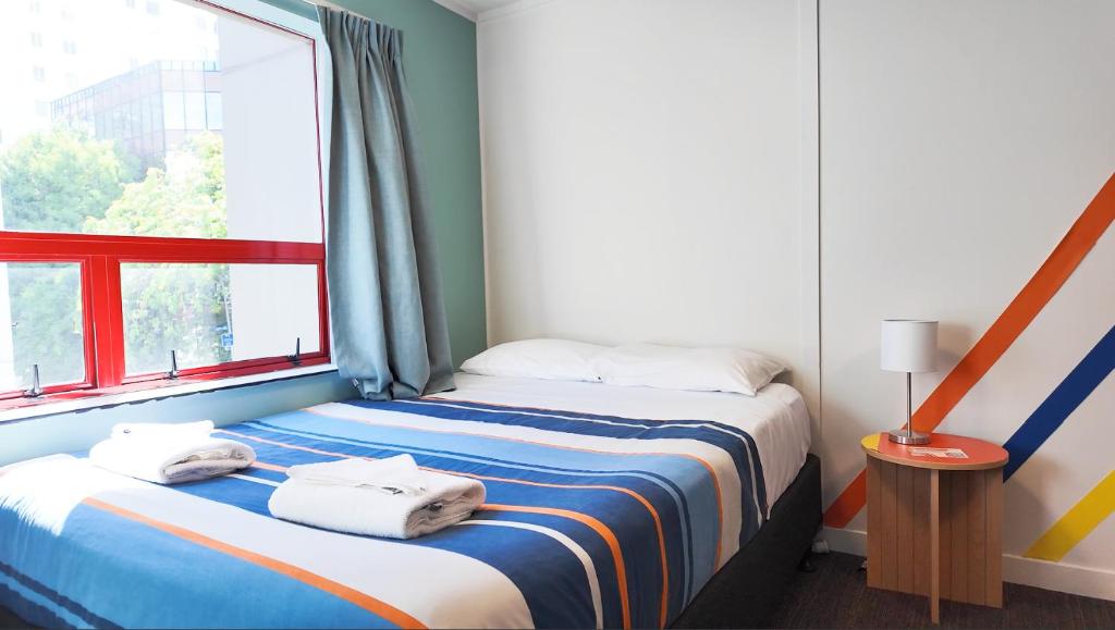 Letto o letti in una camera di United Auckland