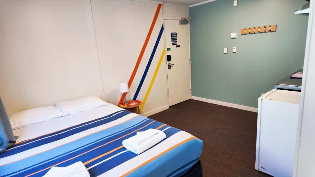 Letto o letti in una camera di United Auckland