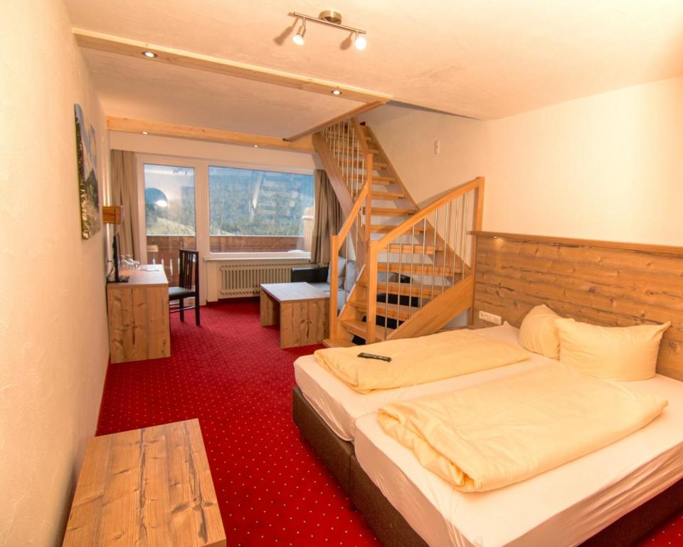 Voodi või voodid majutusasutuse Berghoteltirol toas