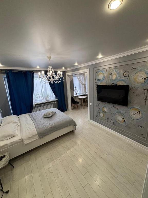 Katil atau katil-katil dalam bilik di Apartamenty Yermekova LoftApart