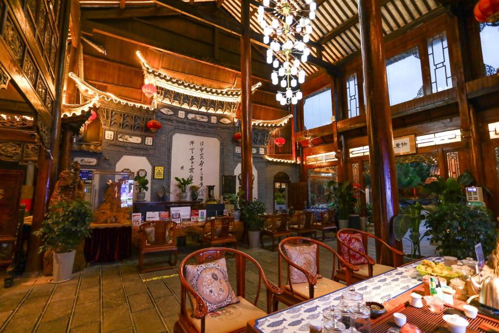Restaurace v ubytování 木老爷客栈