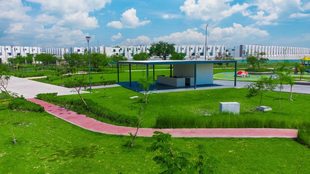 a park with a pavilion in the middle of a park at Casa Moderna con Alberca en Morelos in Xochitepec