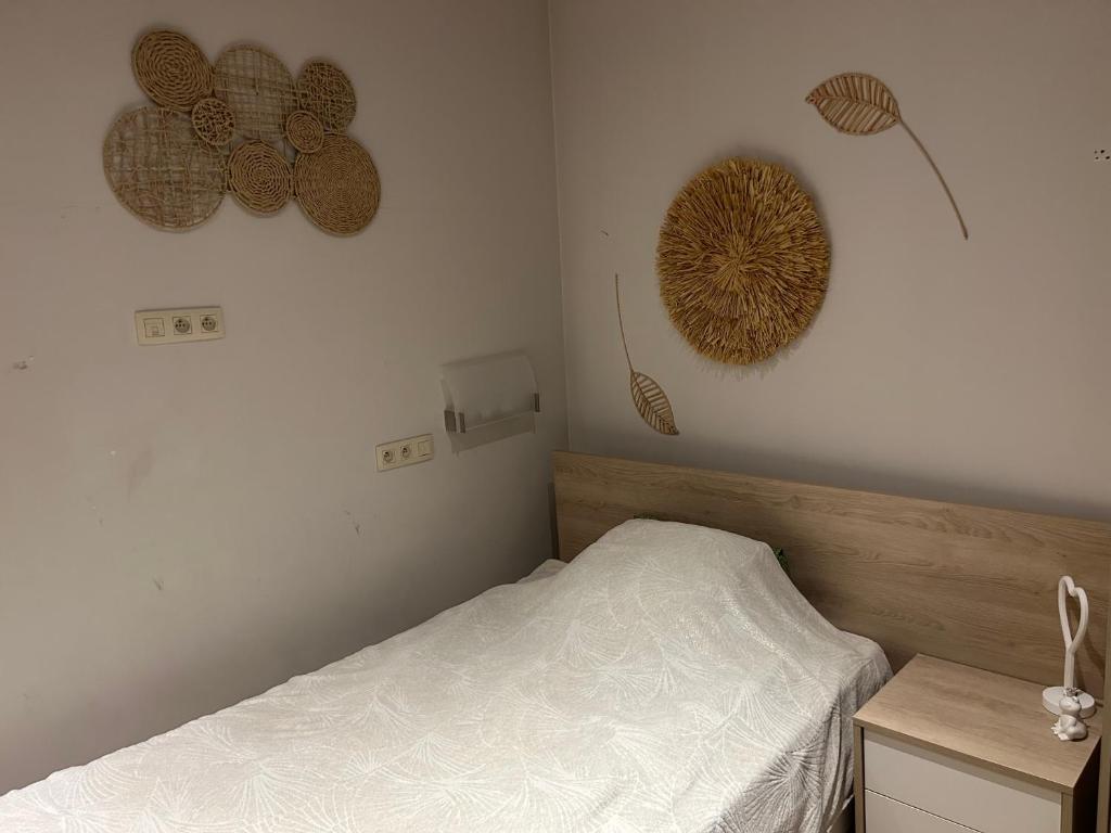 Postel nebo postele na pokoji v ubytování Sucre salé