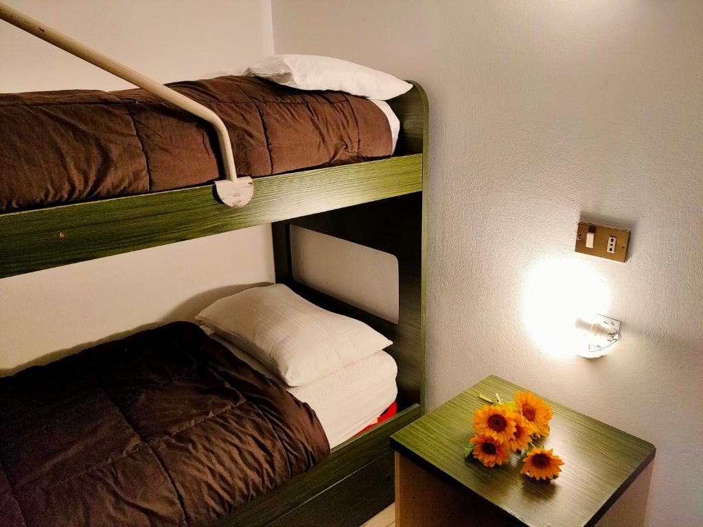 Postel nebo postele na pokoji v ubytování Residence Abete
