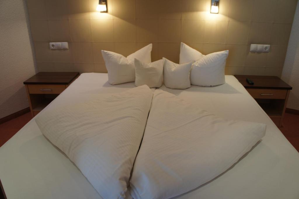 Postel nebo postele na pokoji v ubytování alpinea Appartements