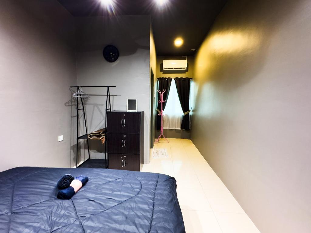 Postel nebo postele na pokoji v ubytování NDD Homestay