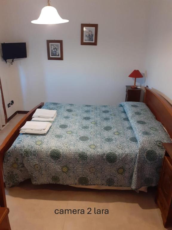 Postel nebo postele na pokoji v ubytování Locanda Primo Sole