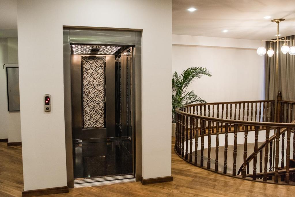 Postel nebo postele na pokoji v ubytování Makmani Boutique Hotel by DNT Group