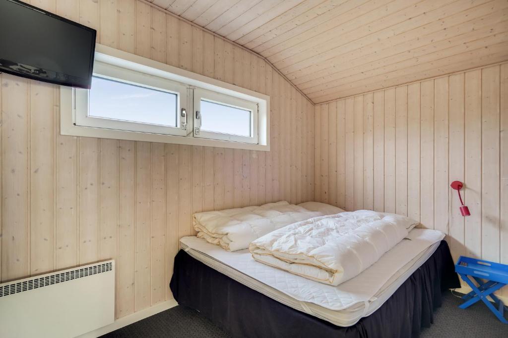 Postel nebo postele na pokoji v ubytování Bjålum