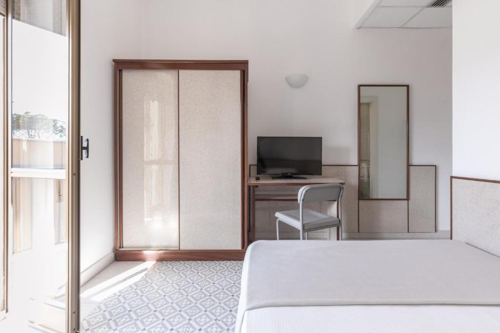 TV a/nebo společenská místnost v ubytování Hotel Serapo