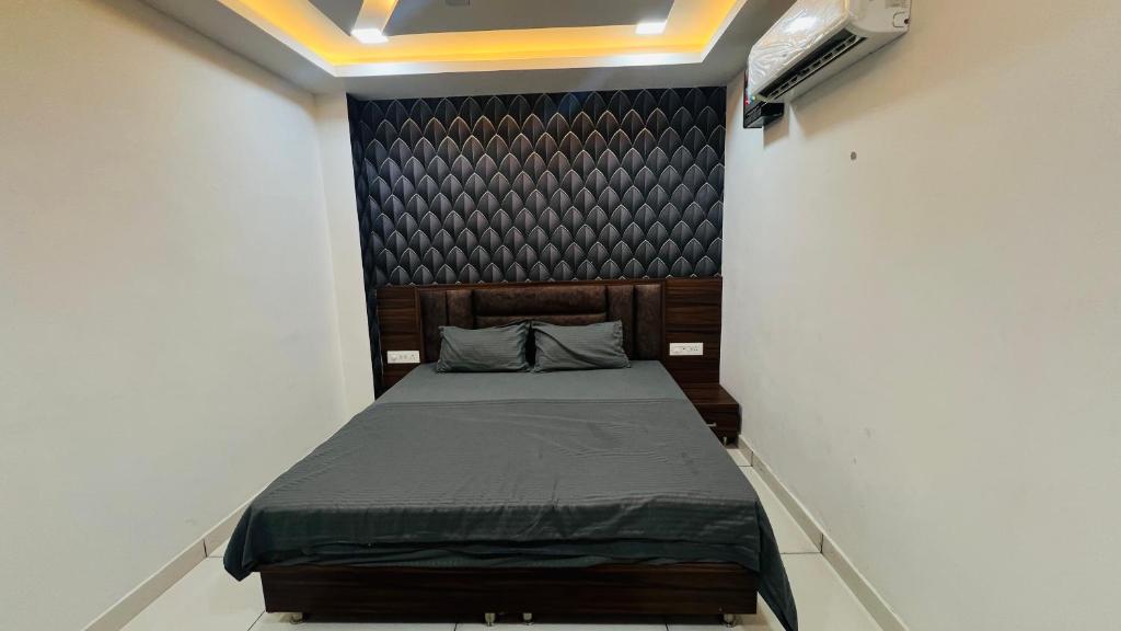 Postel nebo postele na pokoji v ubytování Hotel RUTBA