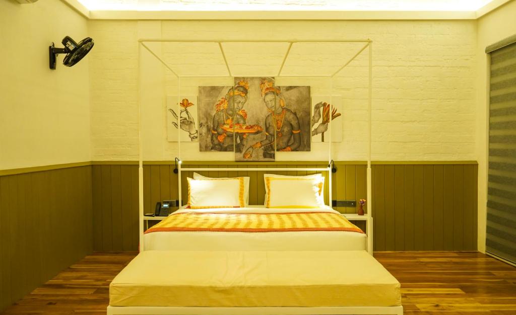 Postel nebo postele na pokoji v ubytování Amba Yaalu - Thema Collection "The first women-led hotel in Sri Lanka"