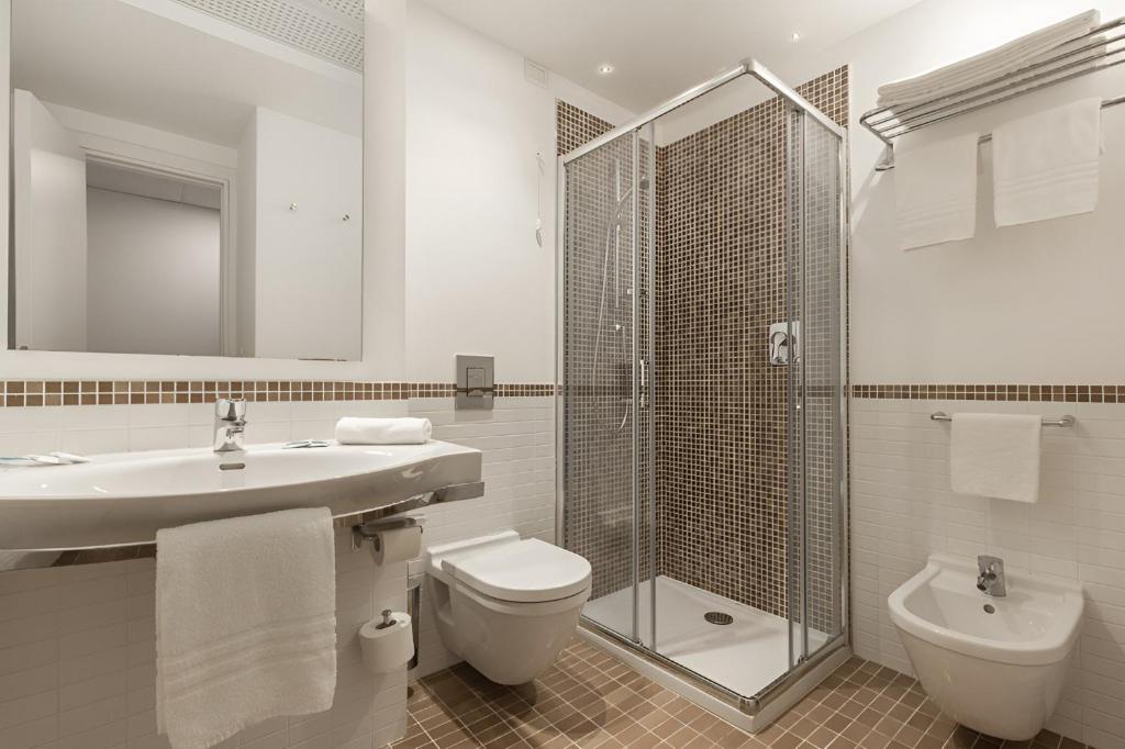 Koupelna v ubytování Hotel Serapo