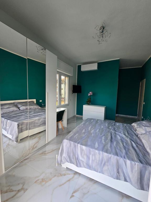 Postel nebo postele na pokoji v ubytování Casa MaDo