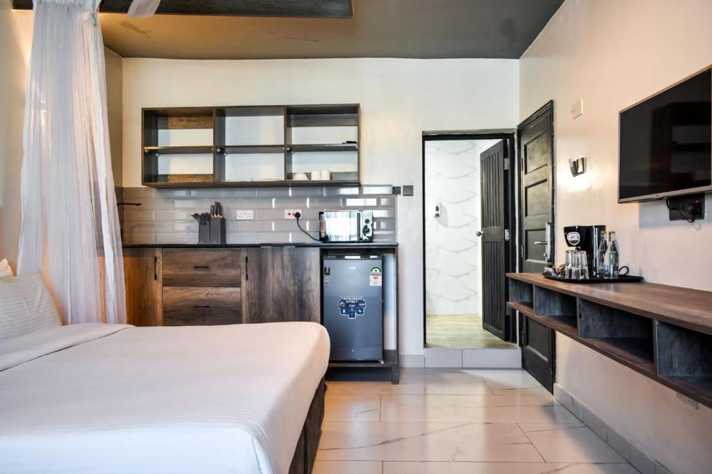 Kuchyň nebo kuchyňský kout v ubytování The Ivory Suites