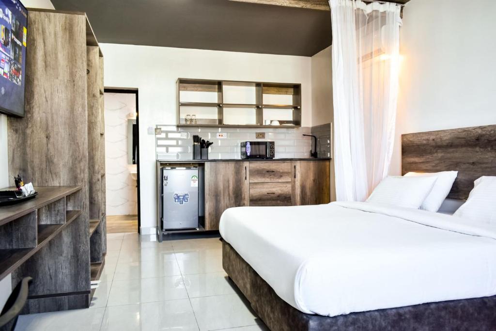 Kuchyň nebo kuchyňský kout v ubytování The Ivory Suites