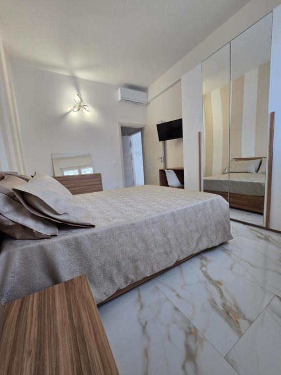 Postel nebo postele na pokoji v ubytování Casa MaDo