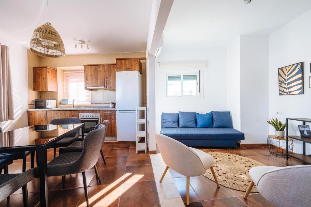 A kitchen or kitchenette at HomeySeville-Lovely Duplex at Santa Cruz 10 pax, Parking Optional