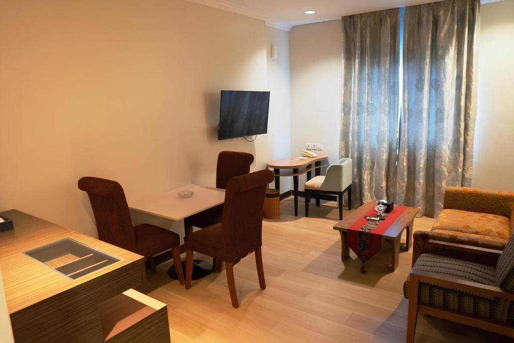 TV a/nebo společenská místnost v ubytování BRITS HOTEL PANGKALAN BUN