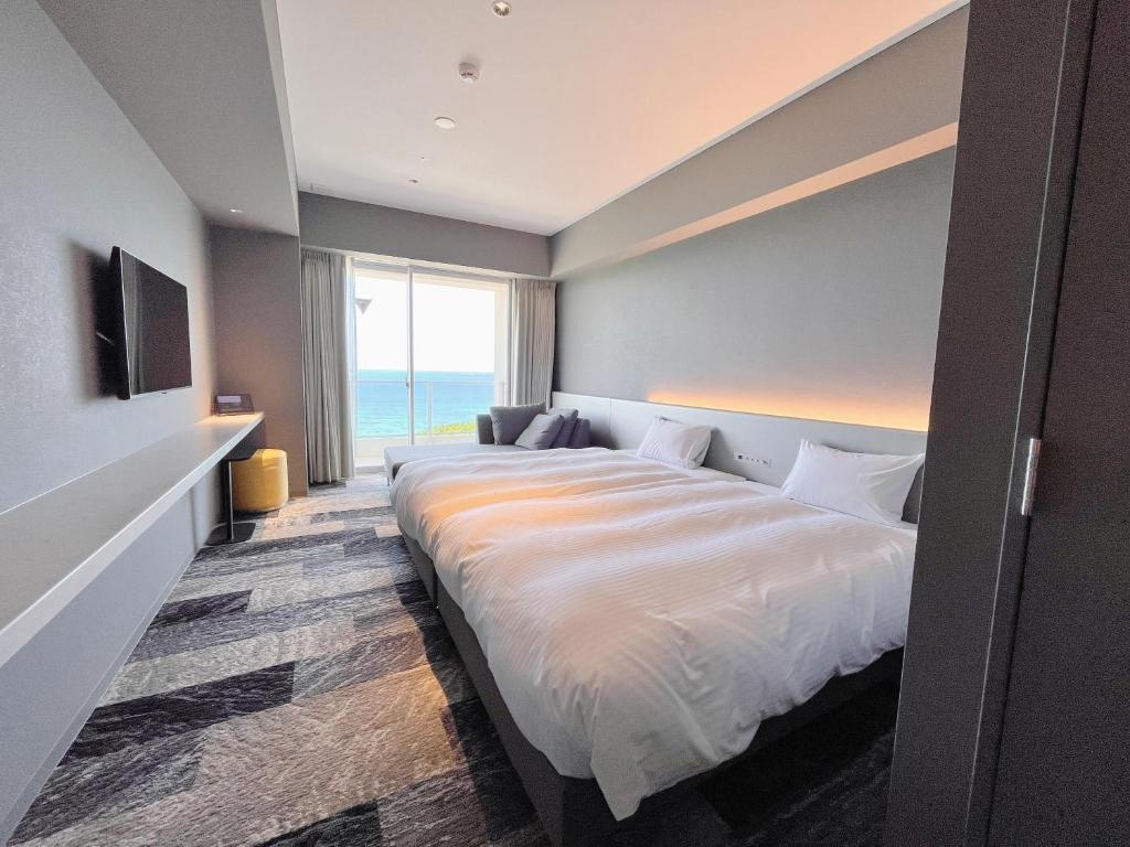 Beachfront asbo stay hotel - Chambre Double Deluxe Avec Terrasse Et Vue Sur L'océan