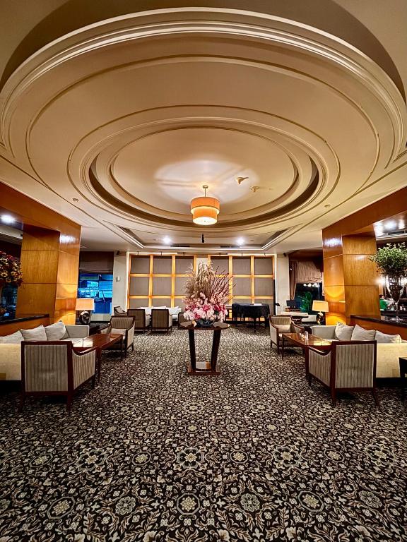 TV a/nebo společenská místnost v ubytování Manado Quality Hotel