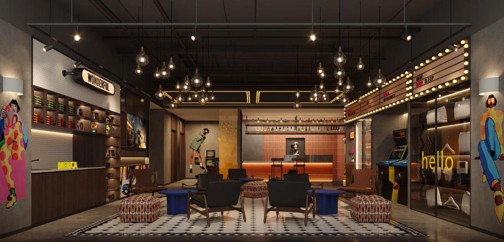 a restaurant with chairs and a table in a room at Mcsrh Hotel-Chongqing Jiefangbei Pedestrian Street in Chongqing