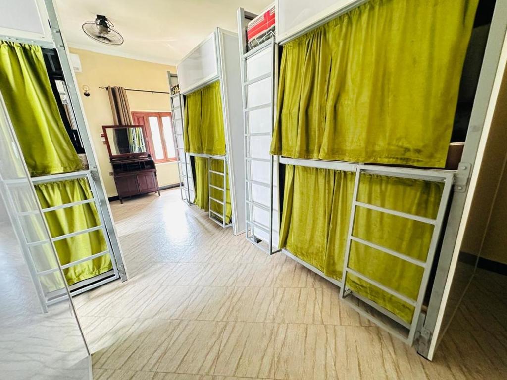 Postel nebo postele na pokoji v ubytování VUGA Hostel