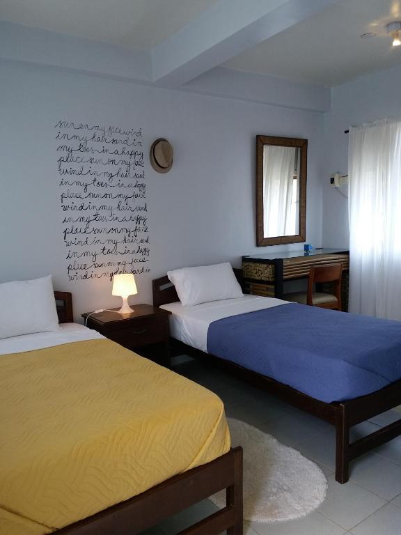 Postel nebo postele na pokoji v ubytování My Hostel Boracay