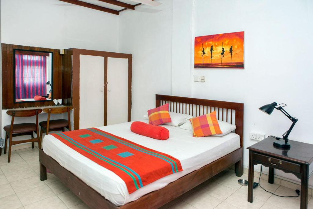 Postel nebo postele na pokoji v ubytování Ranveli Beach Hotel