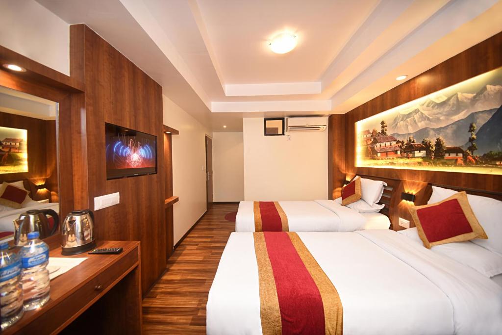 Postel nebo postele na pokoji v ubytování Hotel Friends Home